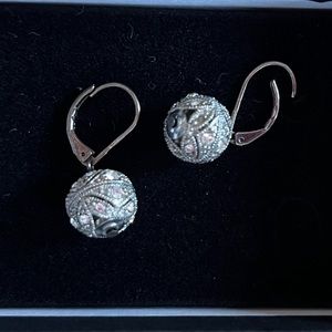 Spherical earrings. Studded